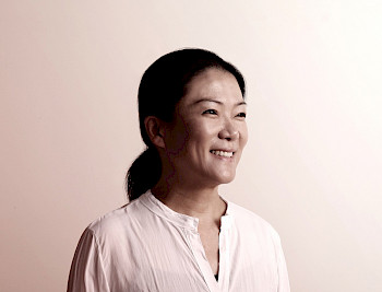 Chiang-Mei Wang lächelt